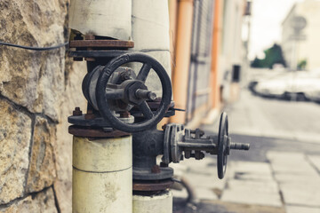 gas pipe with black valve on the street, state pipeline