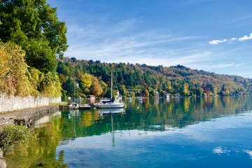 boats on the Lake Orta, Italy, with autumn colors