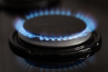 A gas stove in a kitchen. High gas prices and energy crisis concept.