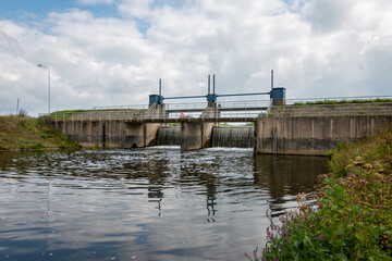 Fototapeta premium A barrage in the river 'the Berkel' close to the village of Eibergen in the region 'Achterhoek', province of Gelderland