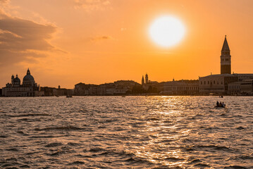 Fototapeta premium St Mark's Campanile tower in Venice, Italy. Beautiful tower at the St. Mark's Square at sunset.