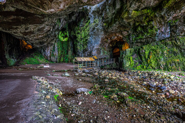 Entrance to Smoo Cave near Durness it has one of the largest sea cave entrances in Britain. The main cavern is over 50 feet high. The cave is located on the popular NC500 driving route