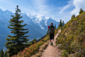 A woman hiking on the famous Tour du Mont Blanc near Chamonix, France.