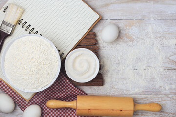 Homemade flour mixture on a wooden table, viewed from above.