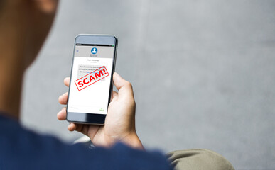 Online dating,scam concept.Man hands using smart phone