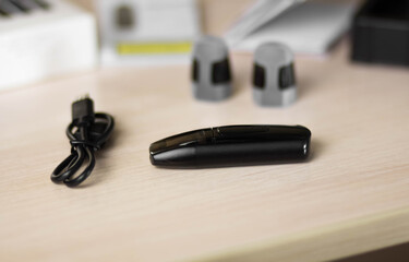Black electronic cigarette. Electronic nicotine delivery system