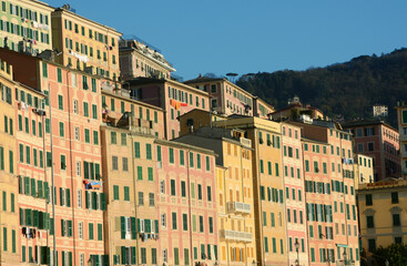 Camogli is beautiful with the incredible colors of the ancient and tall houses that are reflected in the Ligurian Sea. Beauty and colors, sun and sea on the Mediterranean