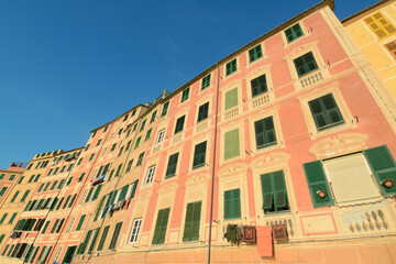 Camogli is beautiful with the incredible colors of the ancient and tall houses that are reflected in the Ligurian Sea. Beauty and colors, sun and sea on the Mediterranean