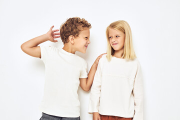 Fototapeta premium Image of boy and girl fight naughty isolated background