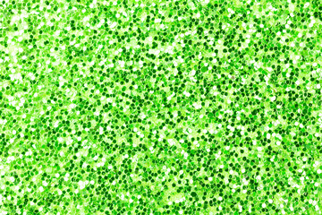 Green shining glowing effects concept, glitter texture background, sandpapper high detailed surface