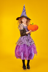 witch girl with a pumpkin