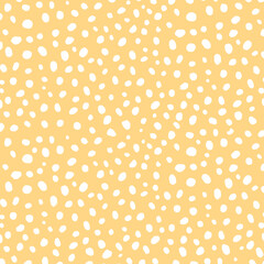 Yellow background vector with white dot patterns