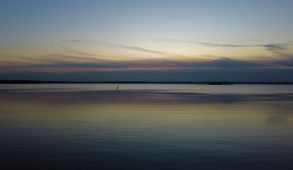 Top view of a beautiful dark sunset on the lake