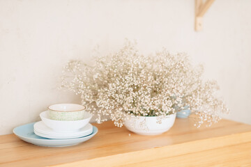 Dry plant in a living room on the table, boho style
