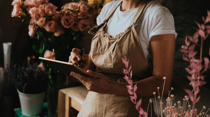 flower business . the florist is working