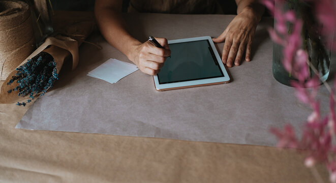 flower business . the florist is working