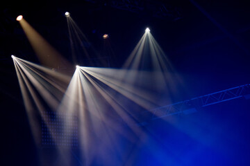 Stage lights glowing in the dark