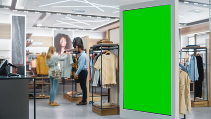 Shot of a Floor-Standing LCD Touch Screen Display with Green Screen Chroma Key Mock Up Standing in...