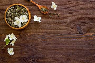Fototapeta na wymiar Dry herbal tea with jasmine flowers. Top view