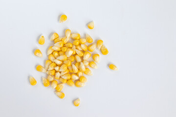 seed corn isolated on white background, top view