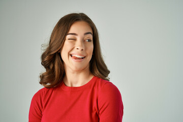 Obraz premium beautiful woman surprised look emotions light background