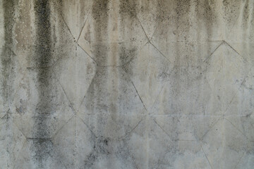 The texture of a stone wall, floors, concrete destruction, overgrown with moss and grass of antiquity, the foundations of building reinforcement and ceilings, chips, paint stains
