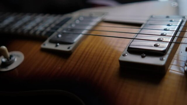 Strings and pickups of beautiful classic electric guitar