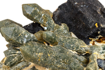 Macro mineral stone Quartz Hedenbergite Prase on ilvite on a white background