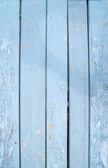 Wooden shield painted in light blue color,background,texture,copy space