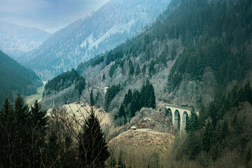 Mountains landscapes with viaduct. Vintage style photo.