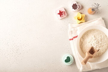 Ingredients for cooking homemade baking. Baking background with flour, eggs, kitchen tools, utensils and cookie molds on white marble table. Top view. Flat lay style. Mock up.