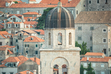 The Dubrovnik Bell Tower in Luža Square. It's also known as Sušak Bell Tower built in the 14th century. Top of the tower, Belvedere, from which you can see beautiful view of the old city of Dubrovnik - obrazy, fototapety, plakaty