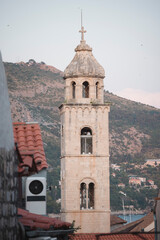 Fototapeta na wymiar Dubrovnik Clock Tower or Bell Tower in Luza Square. It's also known as Susak Bell Tower built in the 14th century. Travel to Dubrovnik, Hrvatska, where most people visit the old town in Croatia