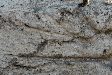 The texture of a stone wall, flooring, concrete destruction, metal corrosion and rusty antiquity, the basis of construction reinforcement and ceilings, paint chips