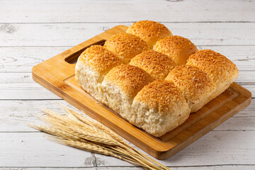 Coconut bread on the wooden table.