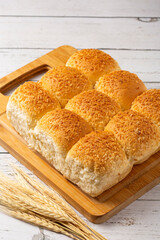 Coconut bread on the wooden table.