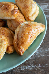Mini empanadas stuffed with apple compote and cinnamon