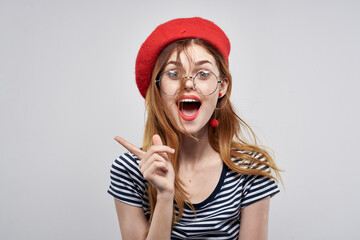 cheerful woman wearing a red hat makeup fashion posing lifestyle