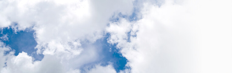 Fototapeta na wymiar Blue sky background with white clouds. Panorama