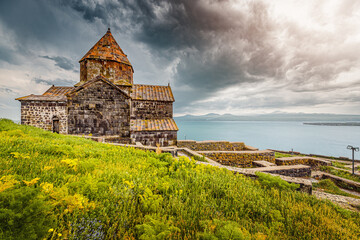 Famous Sevanavank Monastery on the shore of Lake Sevan is the main religious and tourist attraction of Armenia and the entire Transcaucasia in stormy weather