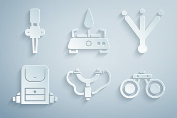 Set Slingshot, Bird footprint, Hiking backpack, Binoculars, Camping gas stove and Torch flame icon. Vector
