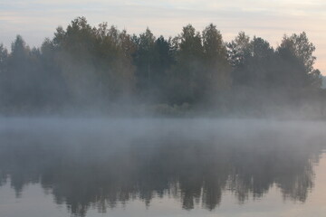 Fog over the river on an autumn morning
