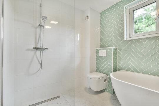 Interior of bathroom with tub and toilet