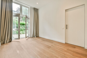 Opened doors of terrace leading to garden in spacious room