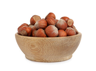Bowl with tasty organic hazelnuts on white background