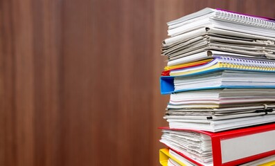 Old manuscripts lie in a stack, beautiful paper background,