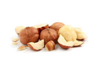 Heap of tasty hazelnuts on white background