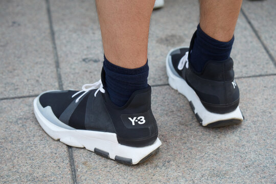 Man with Y3 Yamamoto black and white sneakers on June 15, 2018 in Milan, Italy