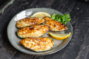 mussels baked cream cheese sauce seafood meal snack on the table copy space food background rustic top view 