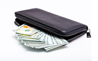 Wallet with money. US dollars close up. Cash in a man's wallet isolated on white background. Financial well-being. Good cash income, wages. Wealthy person.